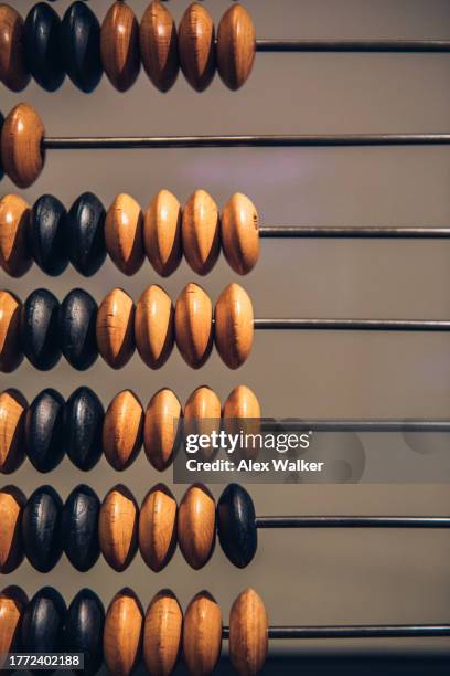 wooden abacus, counting tool. - wooden bead stock pictures, royalty-free photos & images