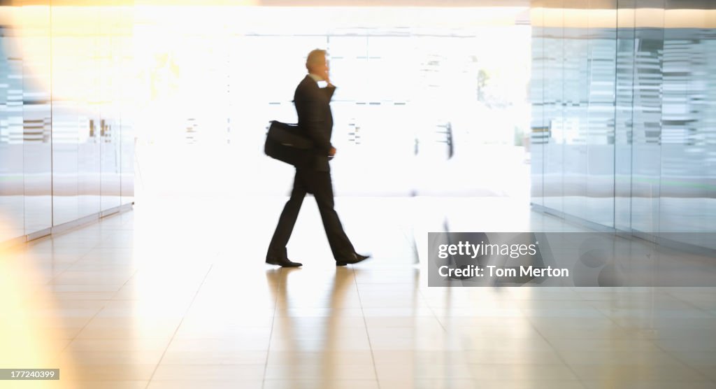 Businessman walking in lobby