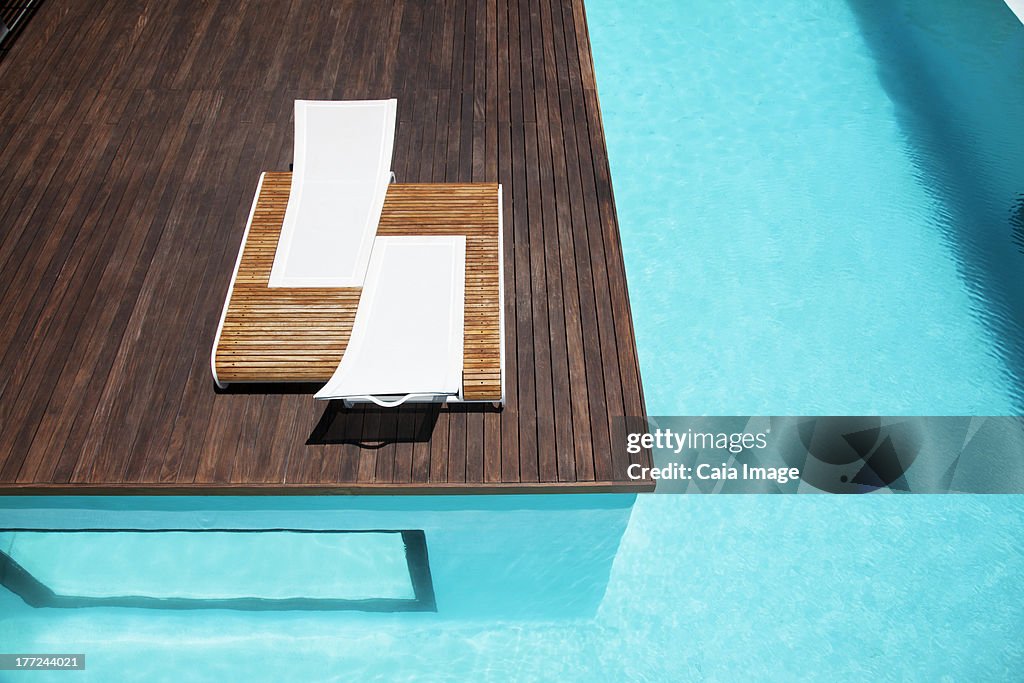 Lounge chairs and swimming pool