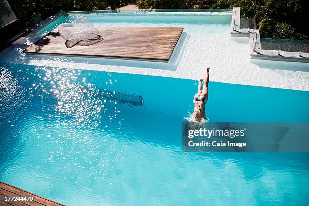 301 Woman Diving Pool Splash Stock Photos, High-Res Pictures, and ...