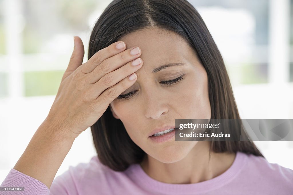 Woman suffering from a headache