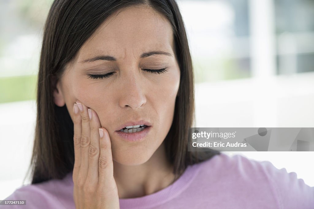 Woman suffering from a toothache