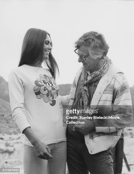 Actress Daliah Lavi with director Sam Wanamaker, behind the scenes of the movie 'Catlow', 1971.