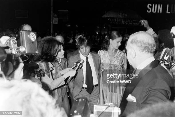 Dustin Hoffman and Anne Byrne attend the New York premiere of "All the President's Men" at the Loews Astor Plaza cinema, followed by an afterparty at...