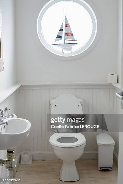 interiors of a bathroom - toilet bowl bathroom stock pictures, royalty-free photos & images