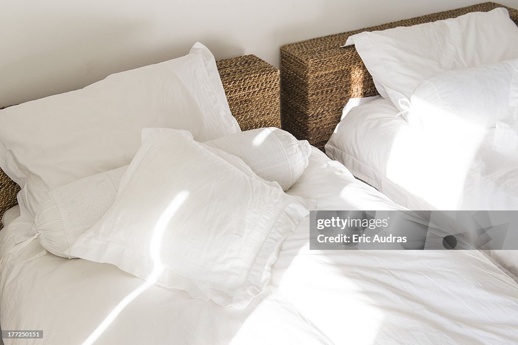 Sunlight falling on a bed
