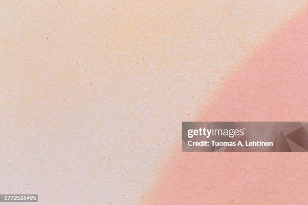 macro close-up of pale pink spray paint with splashes on a white and beige wall. - fundo-bege imagens e fotografias de stock
