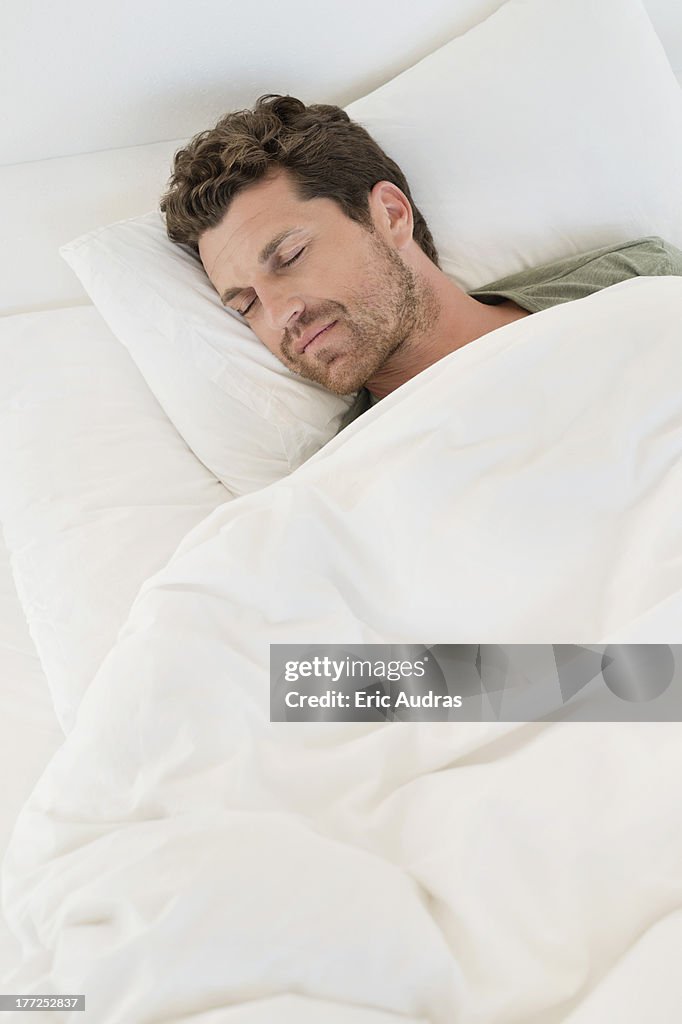 Man sleeping on the bed