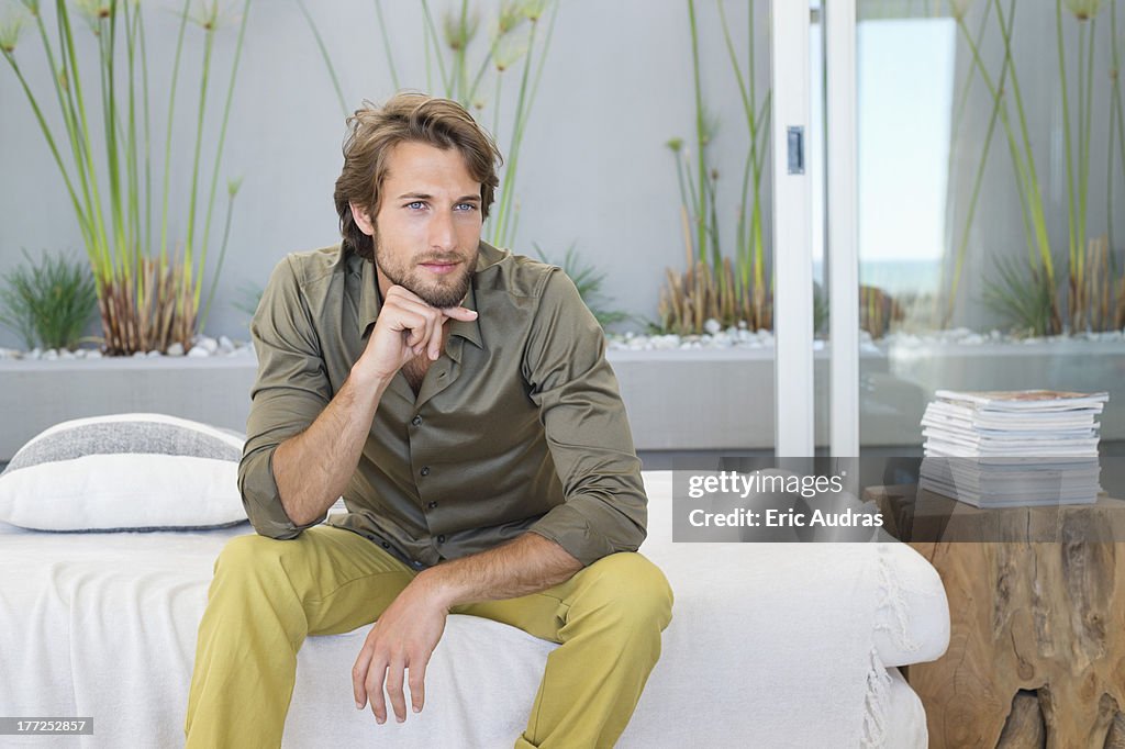 Man sitting at home and thinking