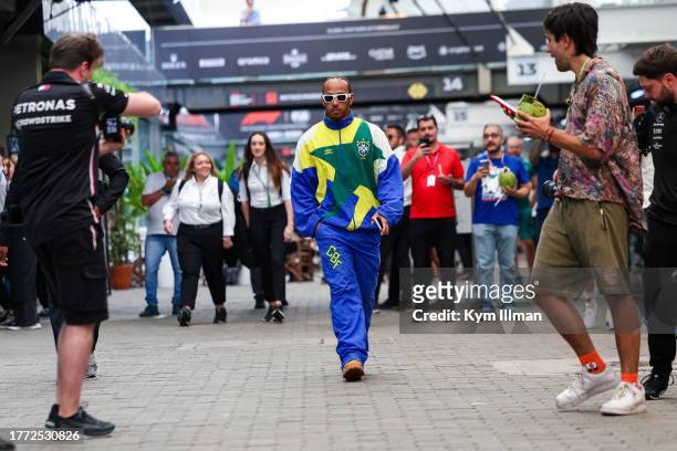 Lewis Hamilton of Great Britain and Mercedes walks in the paddock during practice and qualifying ahead of the F1 Grand Prix of Brazil at Autodromo...