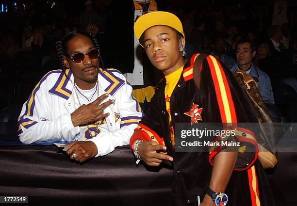 Rapper Snoop Dogg and rapper Bow Wow wait for the start of the at the 2003 NBA All-Star game at the Phillips Arena February 9, 2003 in Atlanta,...