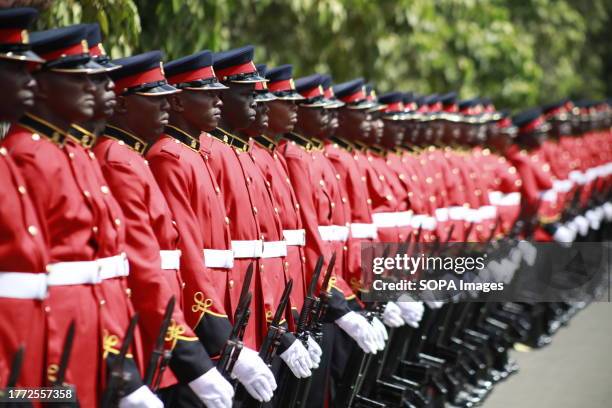 Members of the Kenya Defence Forces stand on guard outside Parliament Buildings moments after the arrival of president William Ruto for the state of...