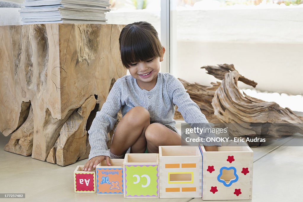 Girl playing with number blocks