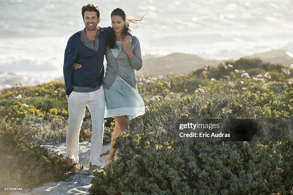 Couple walking on the beach