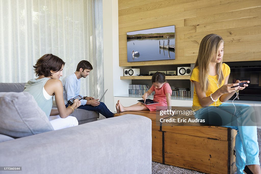 Family using electronics gadgets