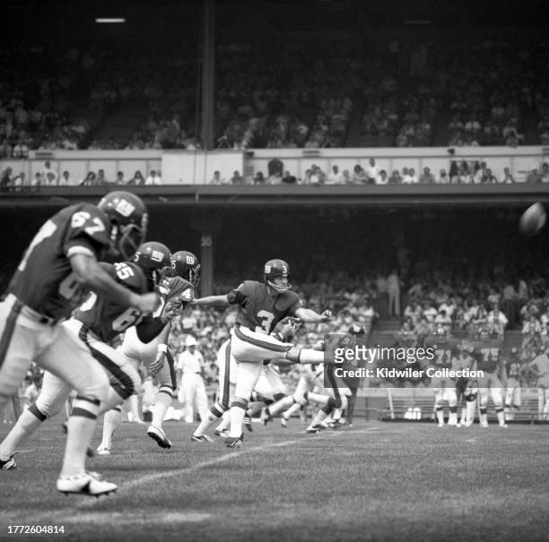 Pete Gogolak of the New York Giants kicks off during a preseason game against the Pittsburgh Steelers at Yankee Stadium on August 1, 1973 in New...