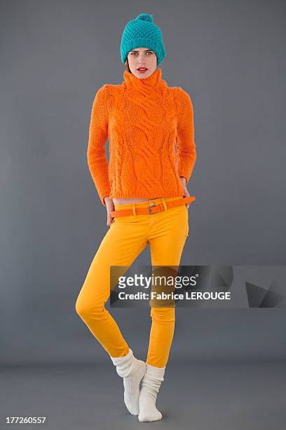 portrait of a woman posing - fashion orange colour stock pictures, royalty-free photos & images
