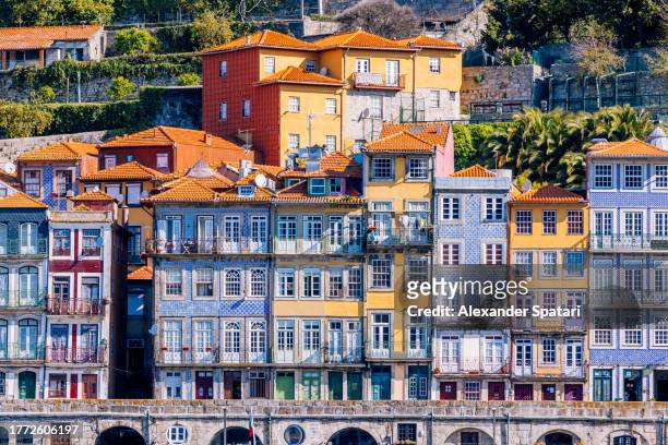traditional portuguese houses with blue azulejo tile in porto, portugal - azulejos stock pictures, royalty-free photos & images