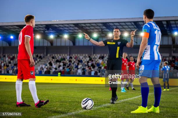 football team captains and referee - football referee stock pictures, royalty-free photos & images