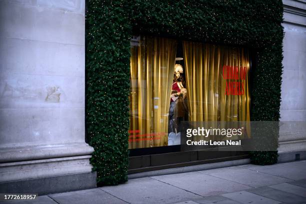 Decorated mannequin is seen in the Christmas window display at Selfridges on November 03, 2023 in London, England. Selfridges' Christmas windows,...