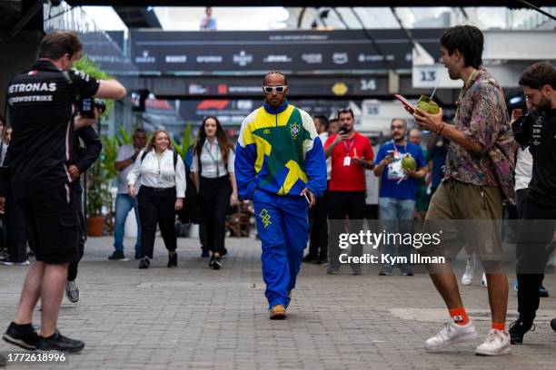 Lewis Hamilton of Great Britain and Mercedes walks in the paddock during practice and qualifying ahead of the F1 Grand Prix of Brazil at Autodromo...