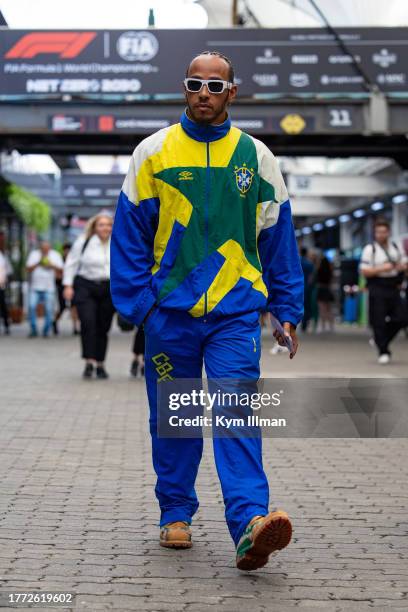 Lewis Hamilton of Great Britain and Mercedes walks in the paddock during practice and qualifying ahead of the F1 Grand Prix of Brazil at Autodromo...