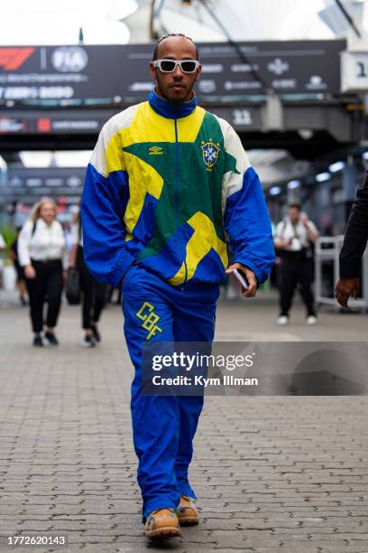 Lewis Hamilton of Great Britain and Mercedes walks in the paddock during practice and qualifying ahead of the F1 Grand Prix of Brazil at Autodromo...