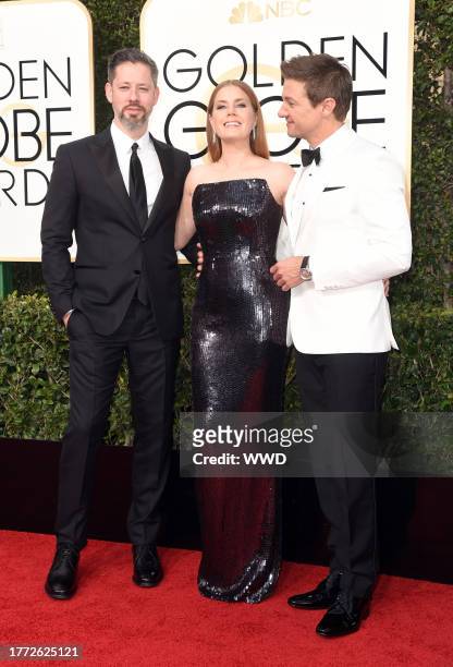 Amy Adams, Darren Le Gallo and Jeremy Renner