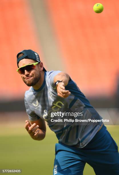 Dawid Malan of England throws a ball during a training session during the ICC Men's Cricket World Cup India 2023 at Narendra Modi Stadium on November...