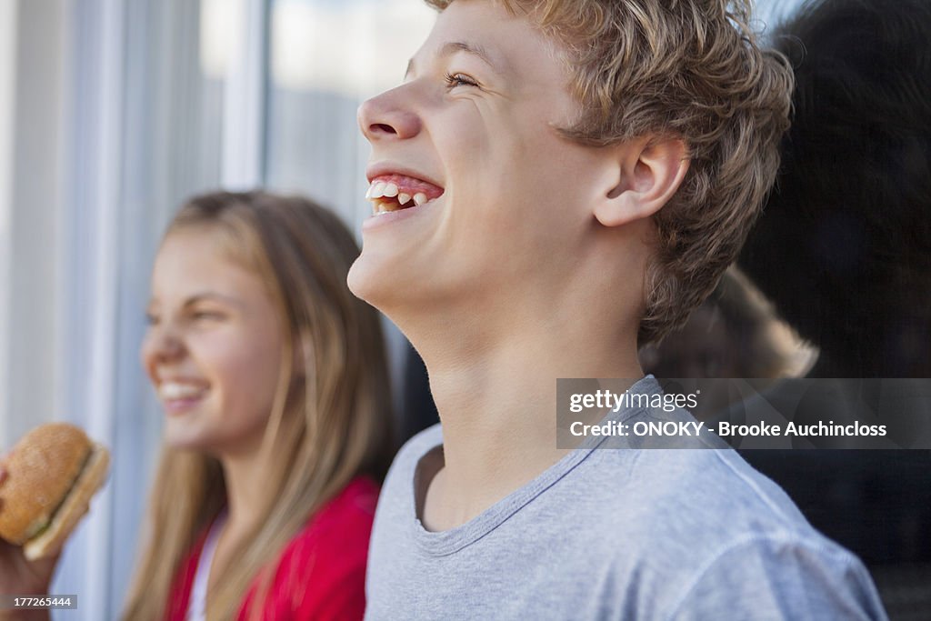 Close-up of friends smiling