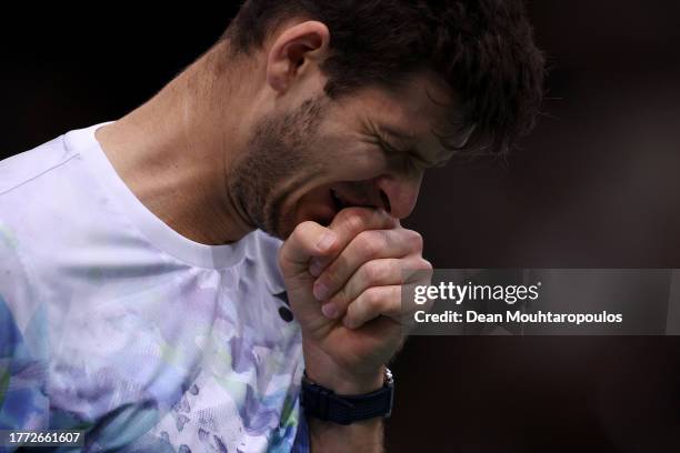 Hubert Hurkacz of Poland reacts to a missed point in his quarter final match against Grigor Dimitrov of Bulgaria during Day Five of the Rolex Paris...