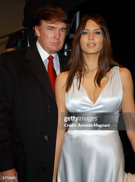 Donald Trump and Melania Knauss attend the Luca Luca fall fashion show February 9, 2003 during Mercedes-Benz Fashion Week in New York City .