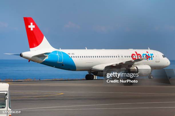 Chair Airlines of Switzerland Airbus A320 aircraft spotted on the taxiway heading for departure. The A320-200 airplane has the registration HB-JOS...