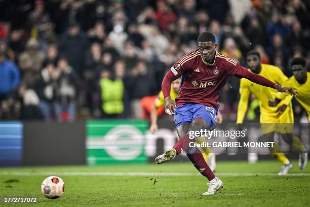 Servette FC's French forward Chris Bedia shoots and scores a penalty during the UEFA Europa League Group G football match between Servette FC and FC...