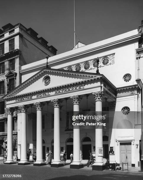 The pedimented portico, featuring six Corinthian columns, at the entrance to the Theatre Royal Haymarket on Haymarket, Westminster, in the West End...