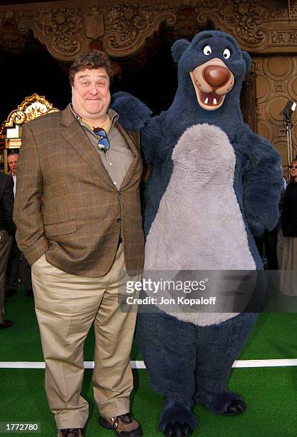 Actor John Goodman and The Jungle Book's Baloo attend the premiere of "The Jungle Book 2" at the El Capitan Theater on February 9, 2003 in Hollywood,...