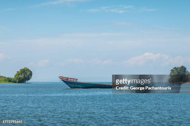 old passenger boat - lago kivu fotografías e imágenes de stock