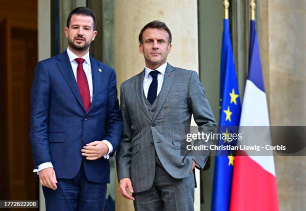 President Emmanuel Macron welcomes Montenegro's President Jakov Milatovic ahead of their meeting, at the Elysee Presidential Palace on November 9,...