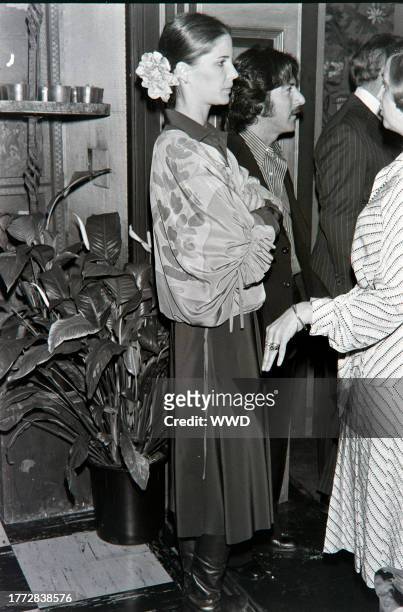 Anne Byrne and Dustin Hoffman attend a party, hosted by Columbia Pictures President David Begelman and his wife, Gladyce Begelman, at Tony Duquette's...