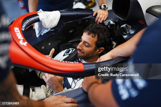 Daniel Ricciardo of Australia and Scuderia AlphaTauri prepares to drive in the garage during practice ahead of the F1 Grand Prix of Brazil at...