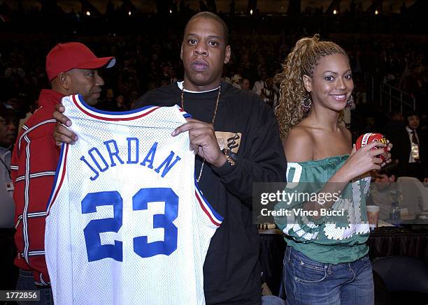 Rapper Jay-Z and singer Beyonce Knowles pose for a photo during the 2003 NBA All-Star game at the Phillips Arena February 9, 2003 in Atlanta, Georgia.