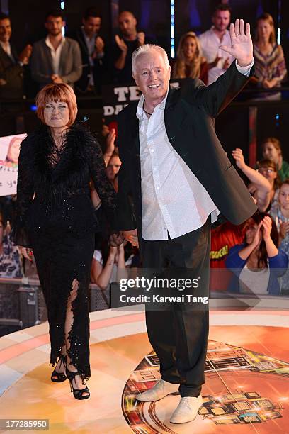 Vicky Entwistle and Bruce Jones enter the Celebrity Big Brother House at Elstree Studios on August 22, 2013 in Borehamwood, England.