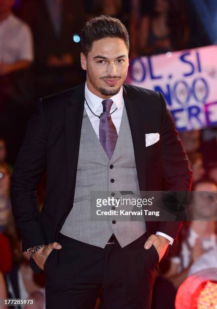 Mario Falcone enters the Celebrity Big Brother House at Elstree Studios on August 22, 2013 in Borehamwood, England.