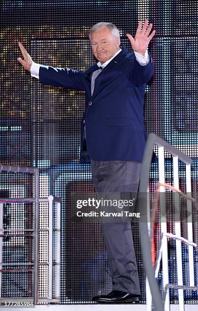 Ron Atkinson enters the Celebrity Big Brother House at Elstree Studios on August 22, 2013 in Borehamwood, England.