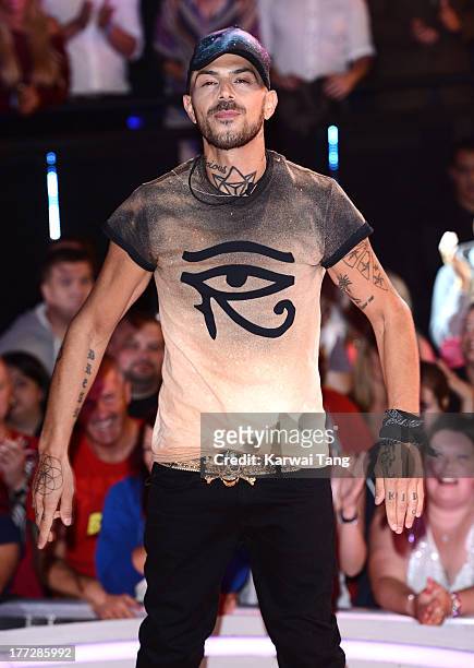 Abz Love enters the Celebrity Big Brother House at Elstree Studios on August 22, 2013 in Borehamwood, England.