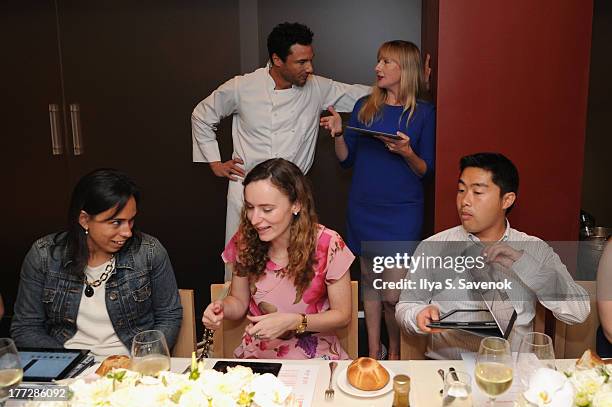 Rocco DiSpirito and Heather Maddan attend Shutterfly Photo Story for iPad dinner hosted by Rocco DiSpirito at SD26 on August 22, 2013 in New York...