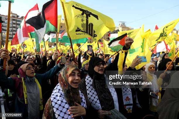 Supporters of Hezbollah gather at al-Ashoura square in southern suburbs of Beirut to listen to the speech of the Secretary-general of Hezbollah...