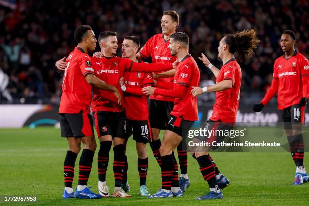 Fabian Rieder of Stade Rennais FC celebrates his goal with Enzo Le Fee of Stade Rennais FC, Guéla Doué of Stade Rennais FC and teammates during the...