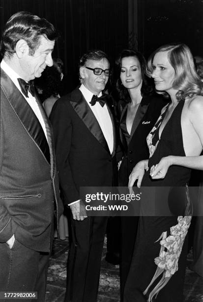 Walter Matthau, Freddie Fields, Cherie Latimer, and Sally Kellerman attend an event at the Beverly Wilshire Hotel in Beverly Hills, California, on...