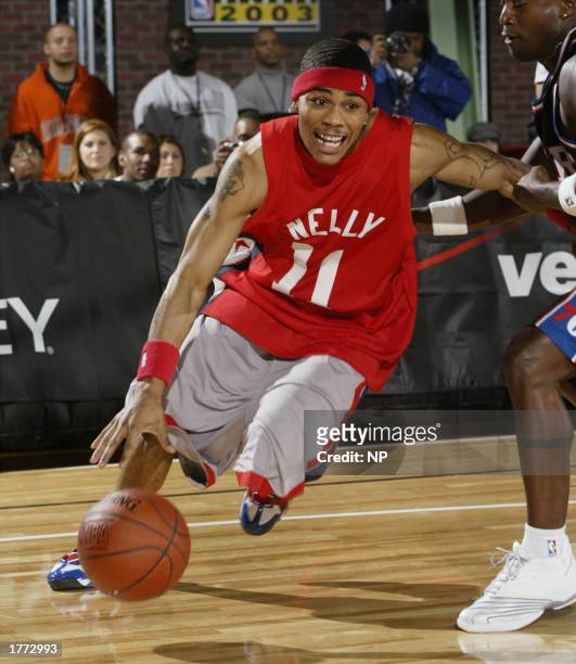 Nelly drives to the basket during the Jeep celebrity 3 on 3 game on February 9, 2003 at the NBA All Star 2003 Jam Session in Atlanta, Georga.
